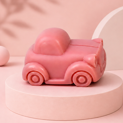 Pink car-shaped soap on a pink platform with a soft pink background